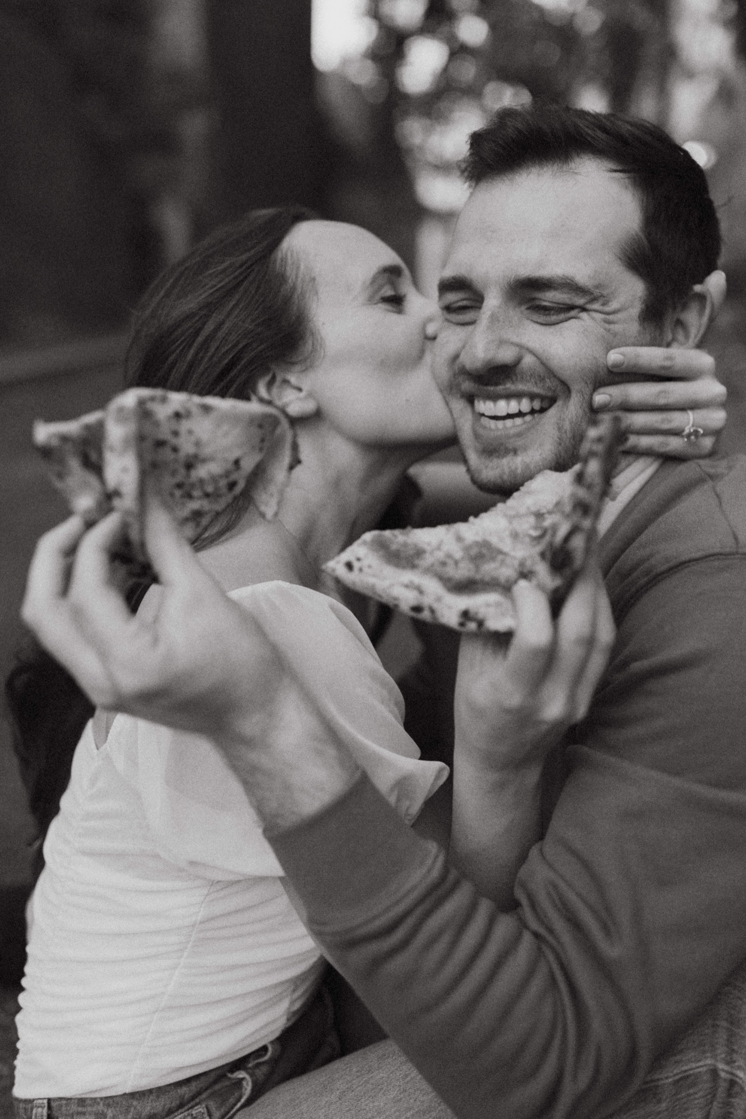 couple eating pizza for DC engagement photos