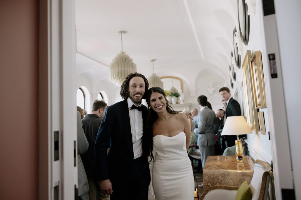 Bride and groom smiling at their wedding ceremony