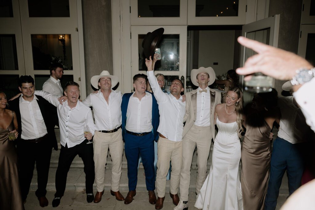 Wedding guests singing on the wedding day.