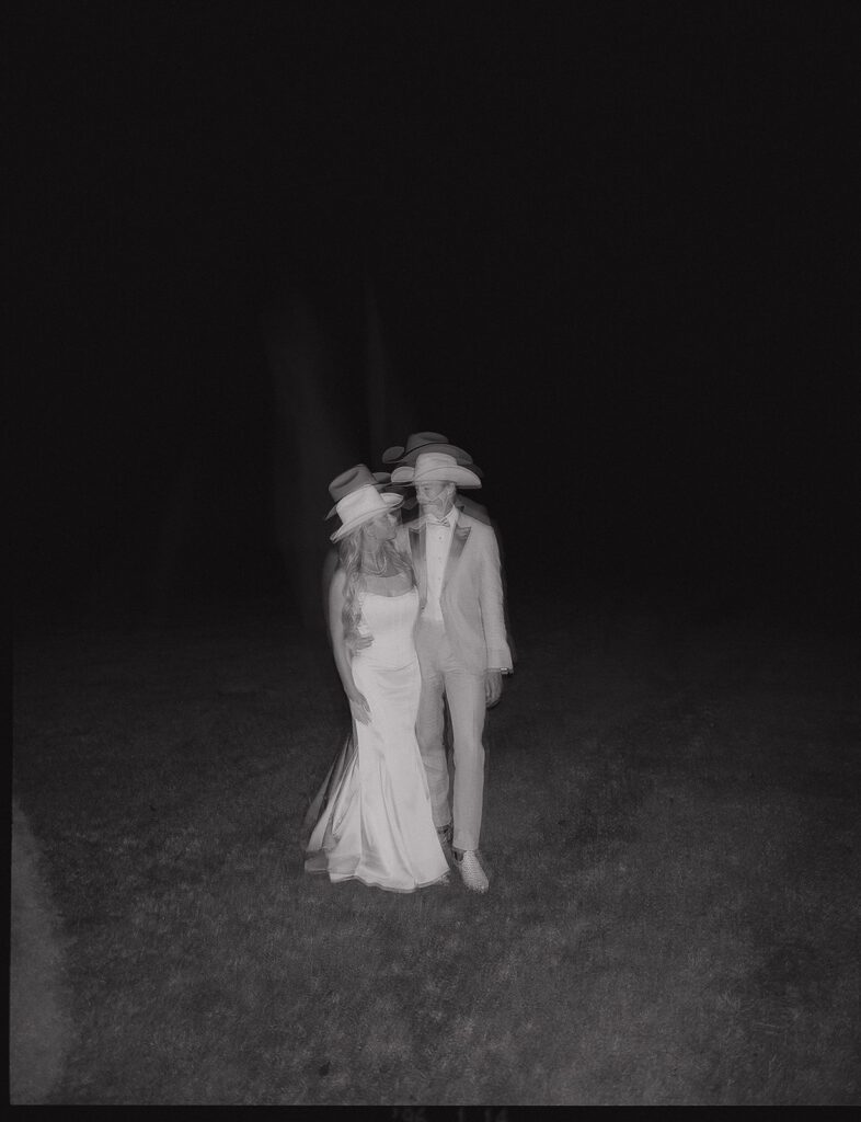 Black and white film of bride and groom.
