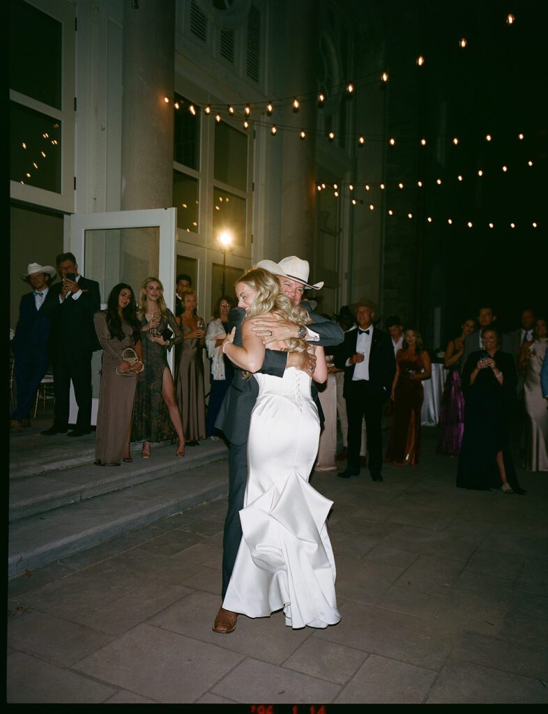 Bride hugging her dad on her wedding day.