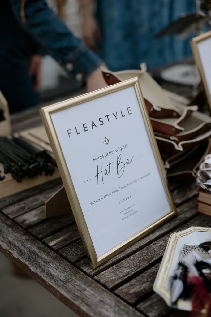 A custom cowboy hat bar sign by Flea Style.