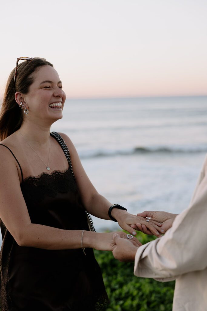 Close-up of Camila’s reaction during her Sunset Cliffs proposal in San Diego