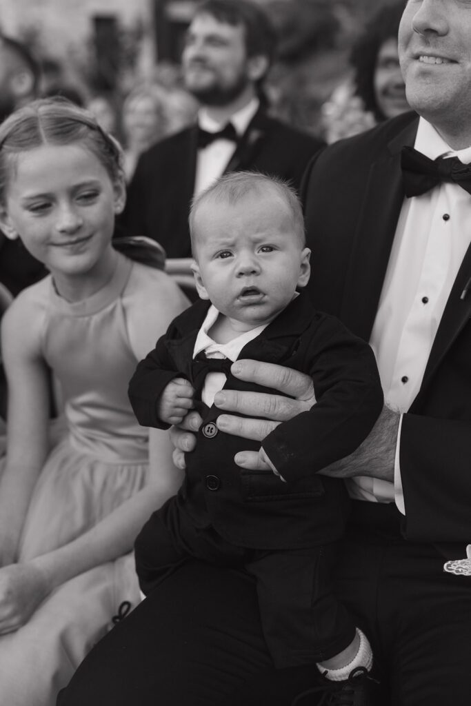 Guest smiling at wedding in California