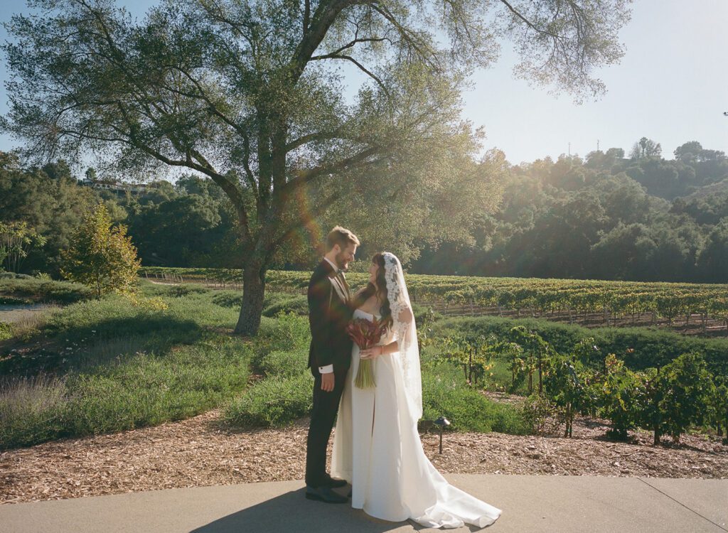 Bride and groom on film at Monserate Winery