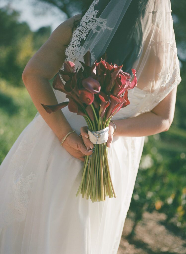 Bride holding her florals