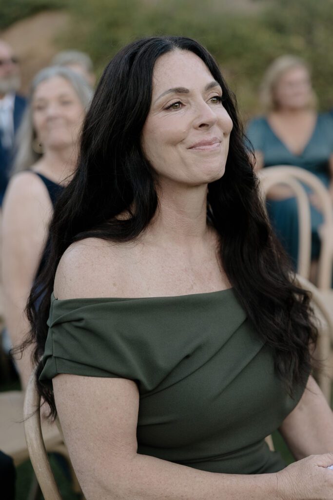 Brides mom crying at wedding ceremony