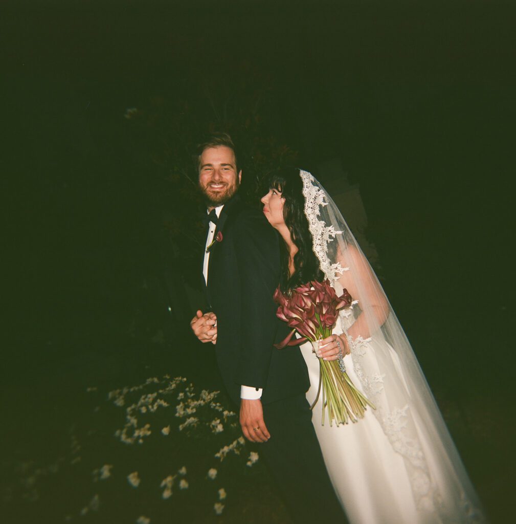 Bride and groom on film at their monserate winery wedding