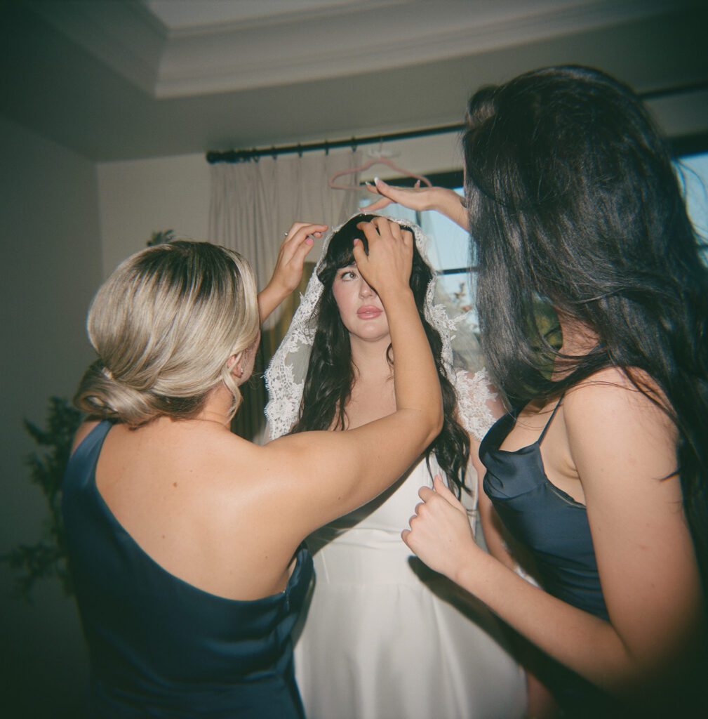 Bride getting ready with her sisters